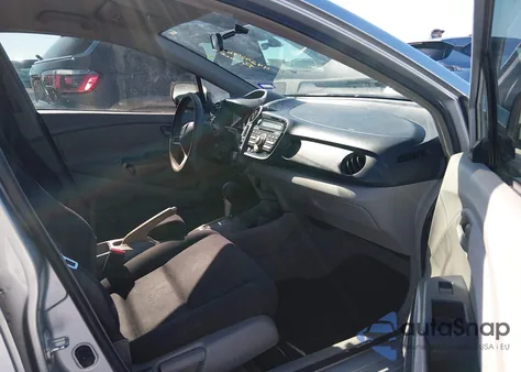 2010 Honda Insight Lx z USA, uszkodzony, nr VIN JHMZE2H51AS042038